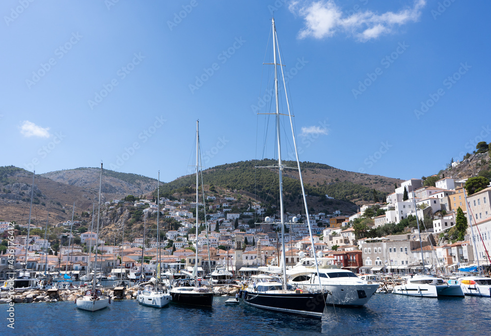 July, 20, 2021. Hydra Island, Greece. View of the bay, ships and attractions of the island of Hydra July, 20, 2021. Hydra Island, Greece. View of the bay, ships and attractions of the island of Hydra