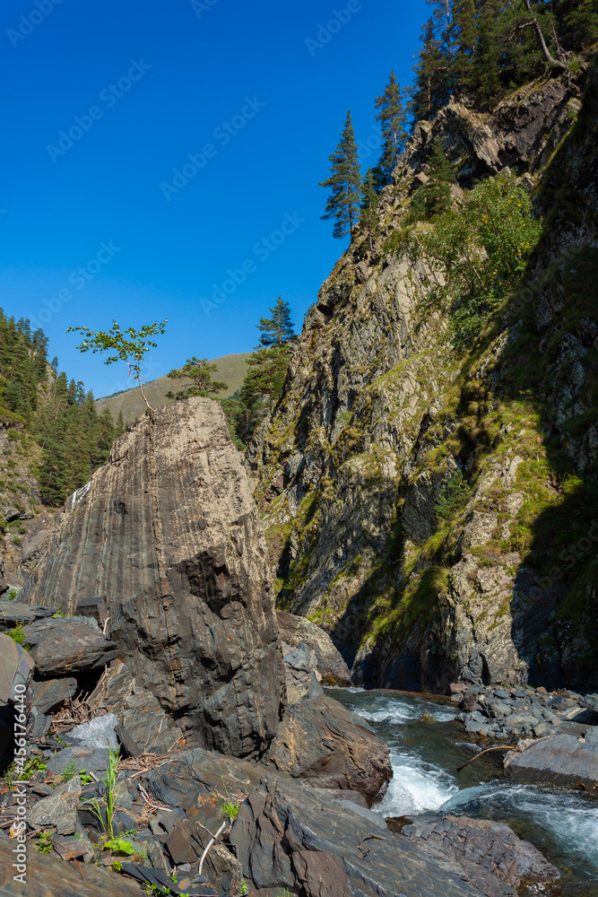 Mountain river among the rocks in Tusheti, travel across Georgia