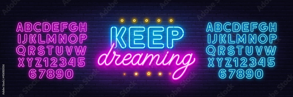 Keep Dreaming neon lettering on brick wall background. Keep Dreaming neon lettering on brick wall background.