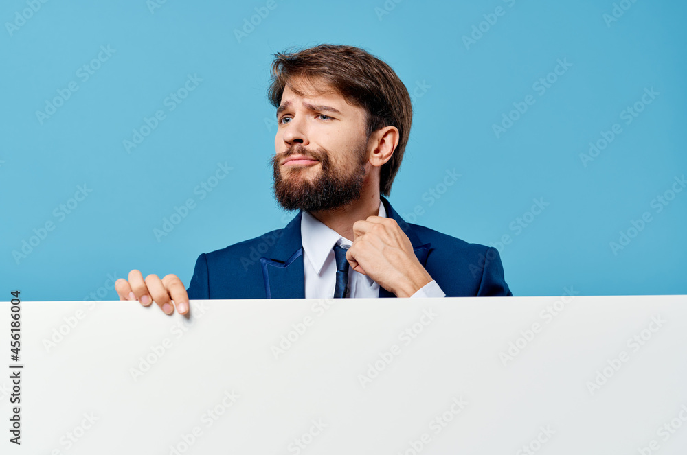 bearded man White mockup poster in hand advertising isolated background bearded man White mockup poster in hand advertising isolated background