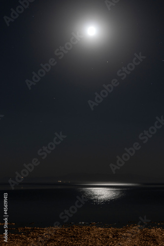 night moon landscape, light reflections on the sea.  © Hatice