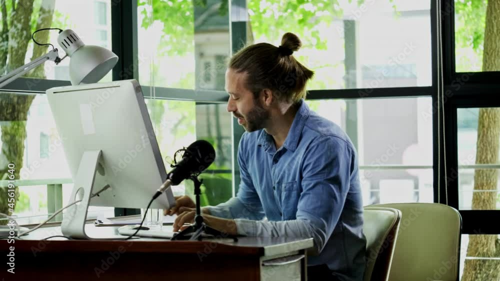 Caucasian Business man with microphone to video call with computer meeting at Home. webinar with colleagues. using video conference app video call virtual communication. entertainment online
Caucasian Business man with microphone to video call with computer meeting at Home. webinar with colleagues. using video conference app video call virtual communication. entertainment online