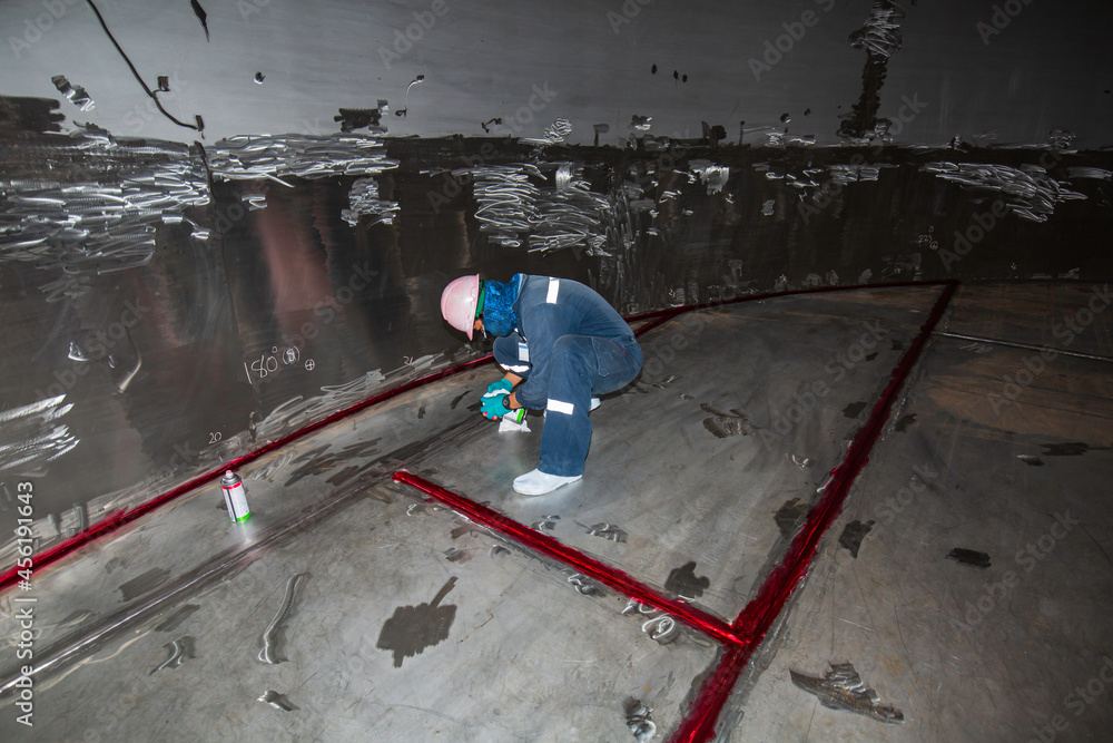 Male into work inspection process chemical color paint  weld red at the with stainless steel tanks