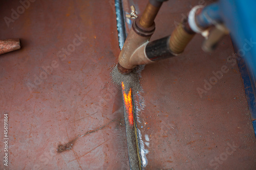 Welding hard surfacing of tank bottom plate stee photo