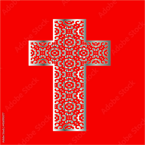 
cross with patterns of metal on a red background. 