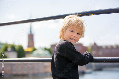 Photography Young preschool child, visiting city of Stockholm with his family, sweden