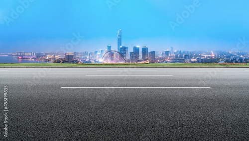 Road and city buildings background