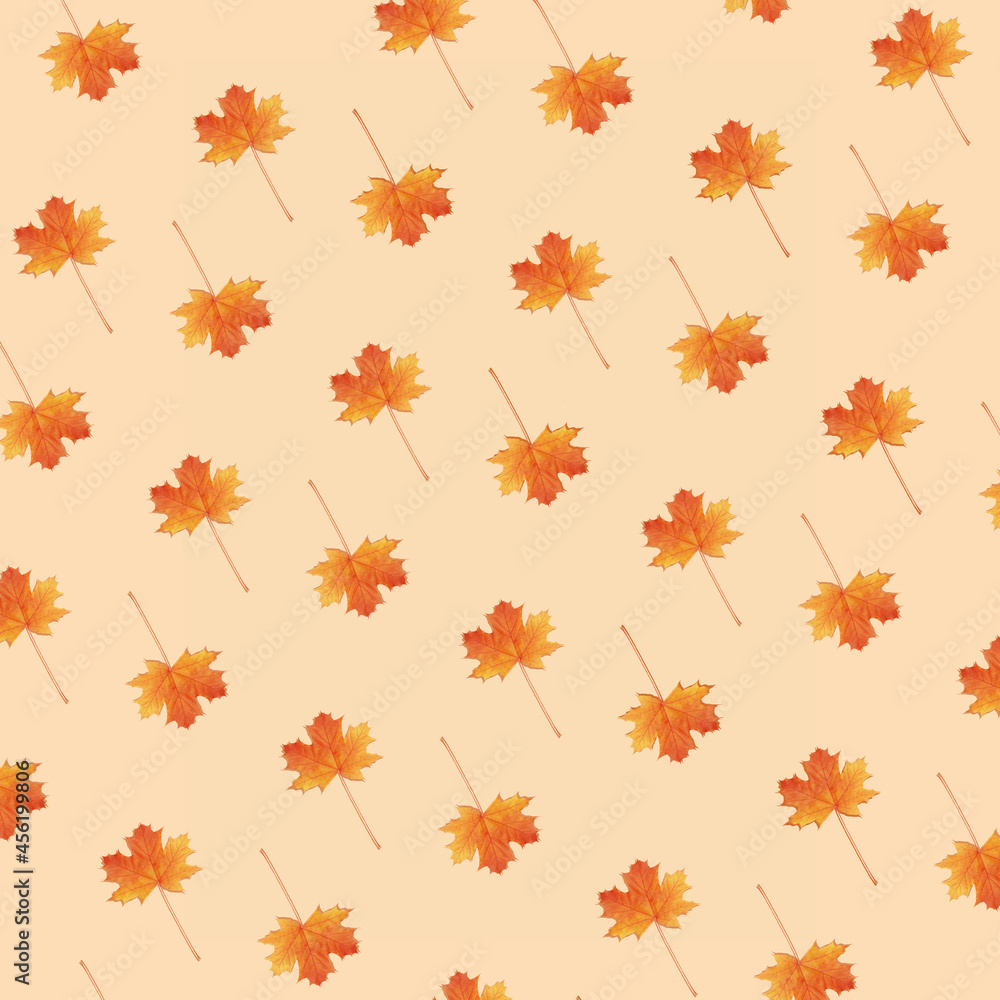 Pattern autumn maple leaf orange-red on orange background Pattern autumn maple leaf orange-red on orange background