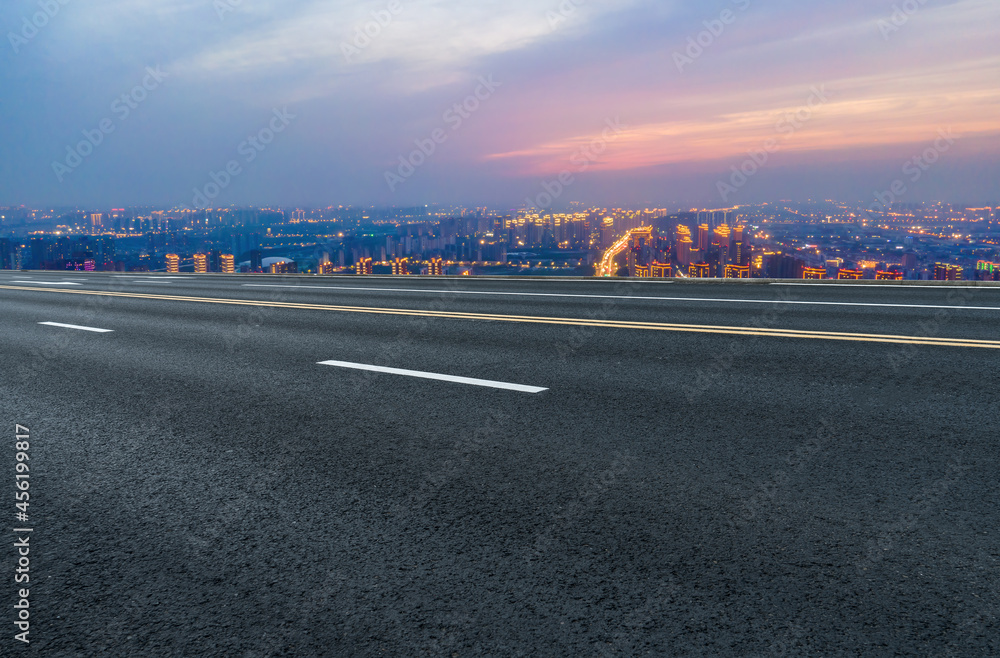 Road and city buildings background