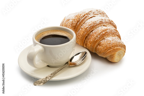 cup of coffee with croissant on white background