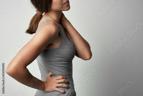 woman with shoulder pain injury dissatisfaction health problems