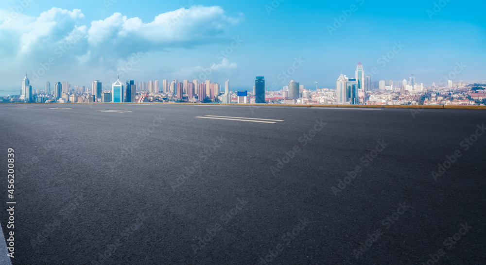 Road and city buildings background Road and city buildings background