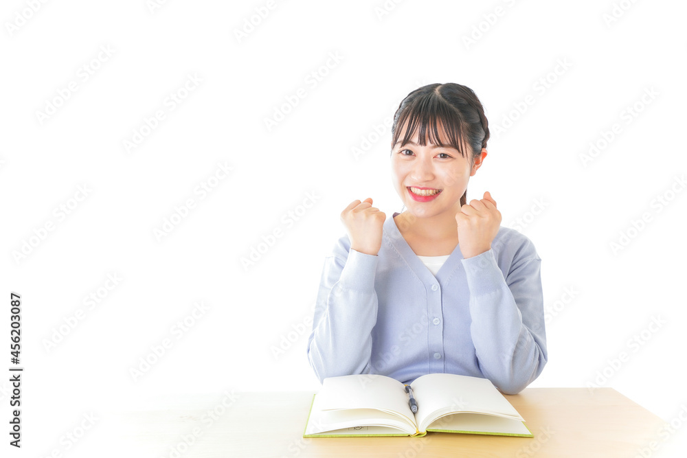 理解をして喜ぶ若い女子学生 理解をして喜ぶ若い女子学生