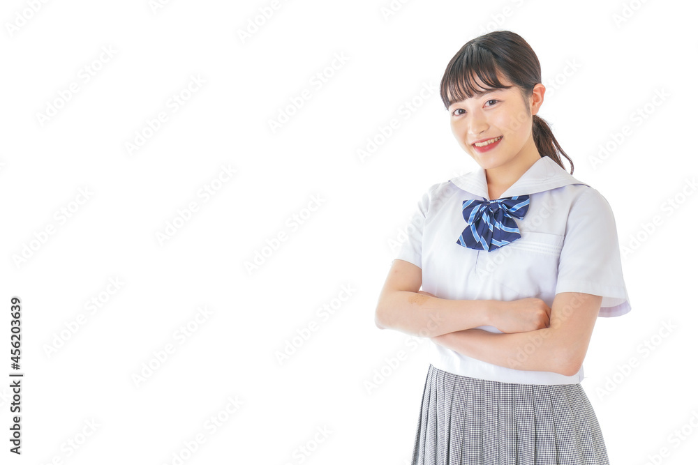 腕を組む制服を着た女子学生 腕を組む制服を着た女子学生