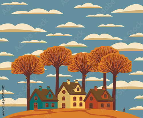 Autumn landscape with cute colored houses on an orange hill, yellowed trees and clouds in the blue sky. Decorative fall vector illustration in flat style