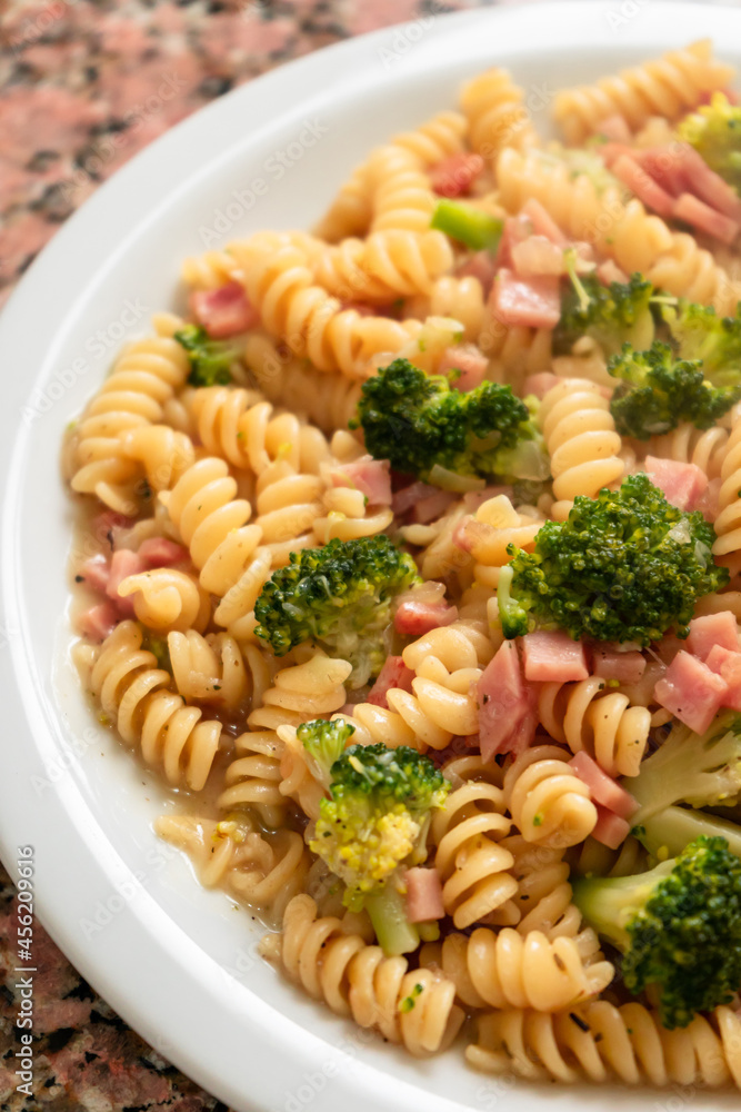 Close-up of pasta with ham and broccoli Close-up of pasta with ham and broccoli