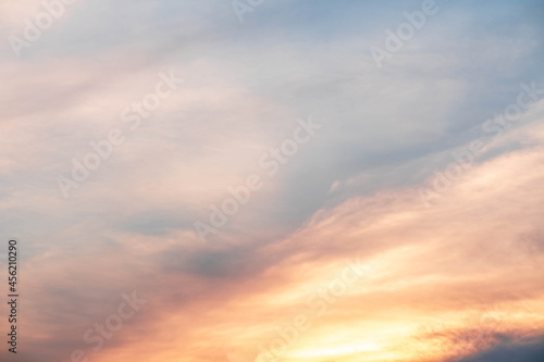beautiful orange clouds and sunlight on the blue sky perfect for the background, take in everning,Twilight