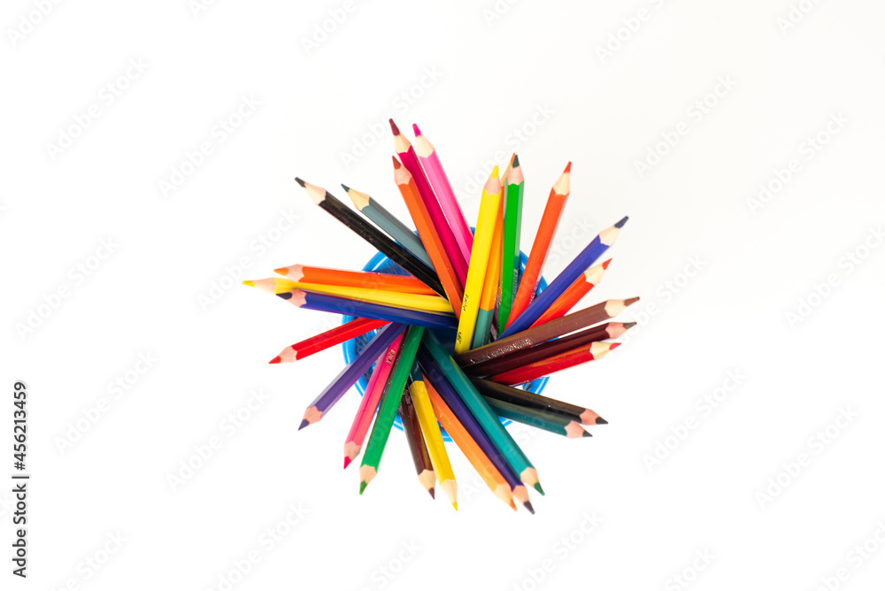 Colored photo of pencils in metal cup isolated on white background Colored photo of pencils in metal cup isolated on white background