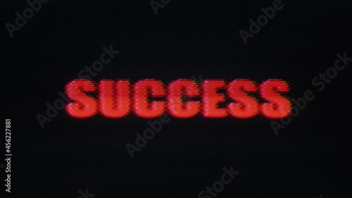Glitchy Success text message on distorted vintage screen - retro CRT cathode ray tube VHS VCR Gaming 80s technology concept