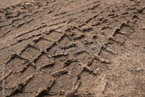 Texture of wet ground surface as background, closeup