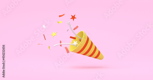 Фотография Exploding party popper with confetti and streamer isolated on background, Celebr