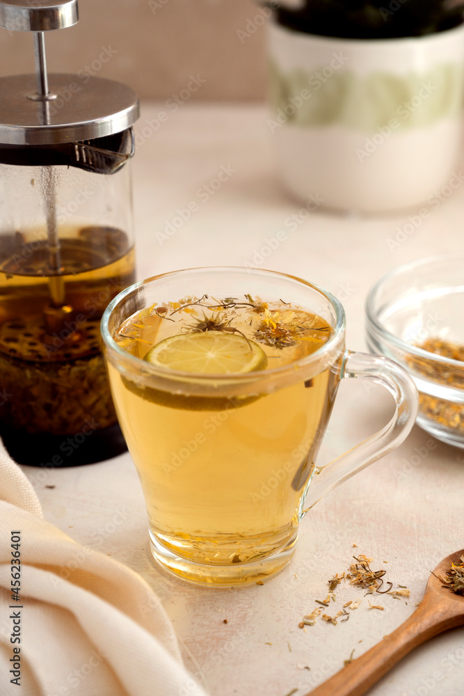Herbal tea glass cups and teapot. Healthy relaxing herbal fresh tea Herbal tea glass cups and teapot. Healthy relaxing herbal fresh tea