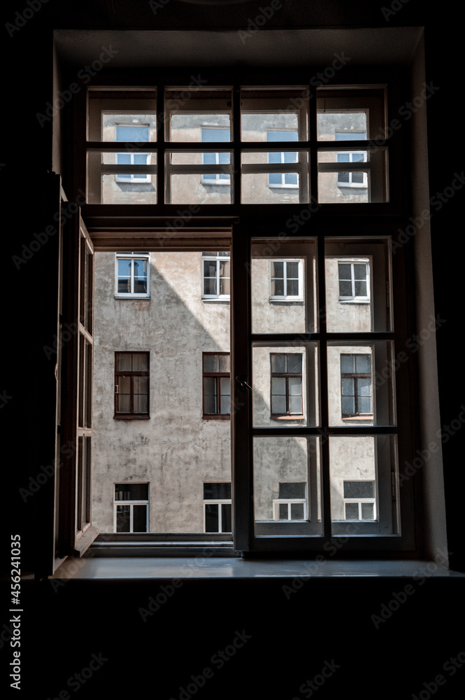 Window, wooden frame, view from open window to the house opposite. Vintage photography (995)