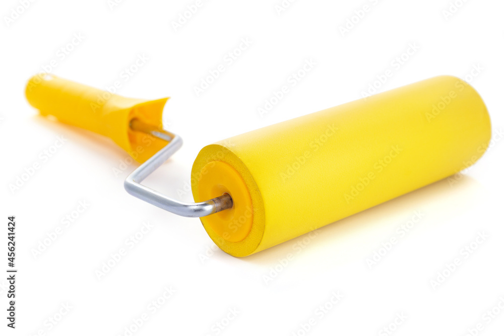 Paint roller isolated at white background. Construction tool for renovation Paint roller isolated at white background. Construction tool for renovation