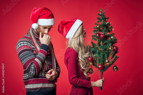 cheerful young couple holiday christmas decoration romance