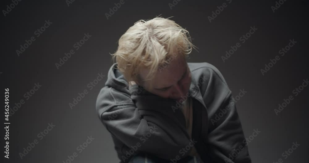 Trying to hurt himself while crying Trying to hurt himself while crying
