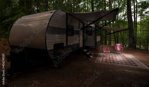 Camper trailer campsite near a lake © Guy Sagi