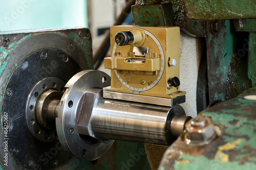 Optical quadrant in the production of tapered mandrels for metal working machines. Protractor tool for measuring the angle of inclination of planes to the horizontal. photo