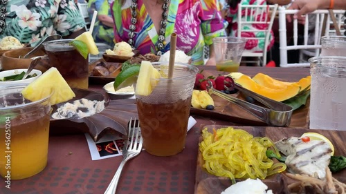 Hawaiian plate of food at Luau shredded pork on dinner table in Hawaii 60p