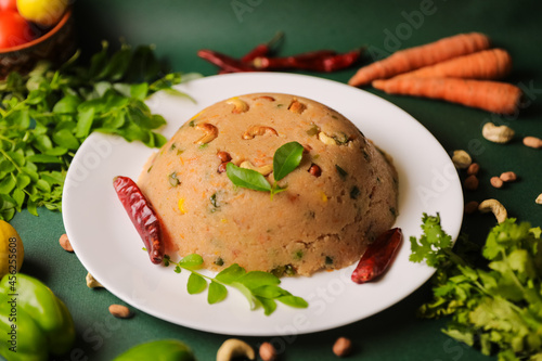 Upma, Indian style famous breakfast , upma in a bowl closeup photo