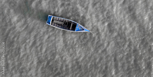 Little blue fishing boat on the Atlantic ocean  © Henrry L