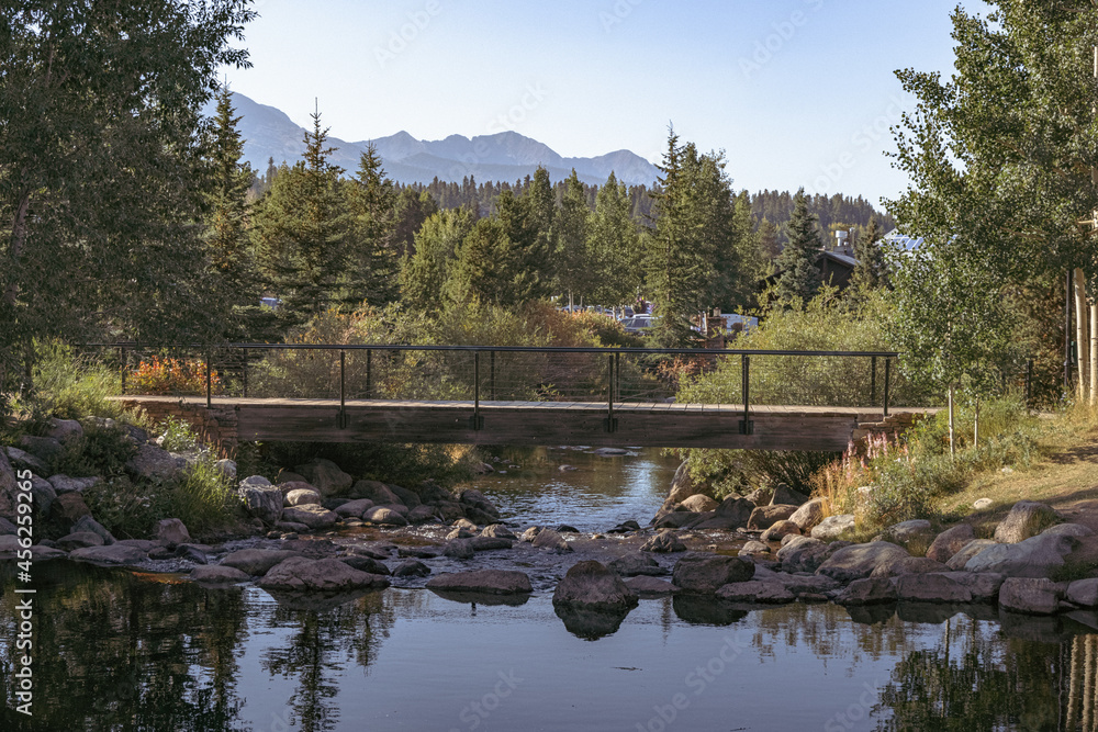 Bridge over rocky stream in Breckenridge Colorado