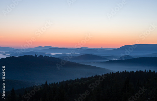 landscape with mountains and fog in the valleys in the morning © sebi_2569