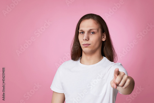 Wallpaper Mural Portrait of smiling man pointing at camera Torontodigital.ca