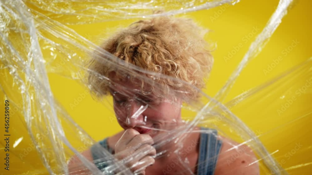 Positive shy smiling LGBT man turning to camera in slow motion smiling ...