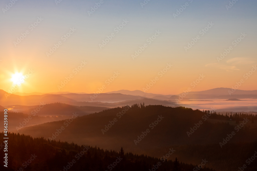 A beautiful landscape with sunrise over the mountains