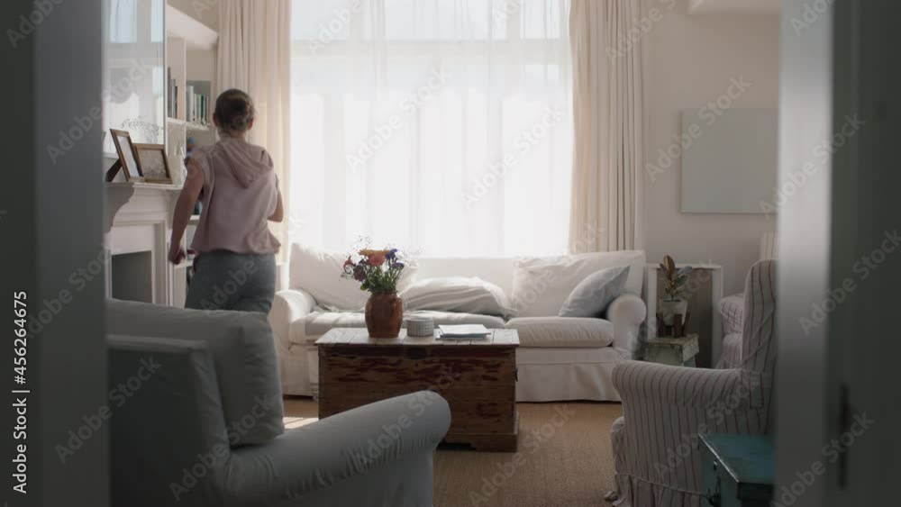 happy teenage girl dancing at home having fun celebrating weekend with funny dance moves playful teen enjoying freedom 4k footage happy teenage girl dancing at home having fun celebrating weekend with funny dance moves playful teen enjoying freedom 4k footage