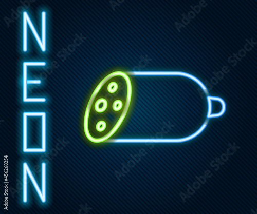 Glowing neon line Salami sausage icon isolated on black background. Meat delicatessen product. Colorful outline concept. Vector