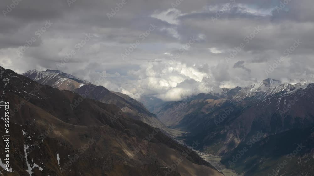 4k time-lapse video of the current of clouds and changes in the weather in the mountains in spring. Altogether cumulus clouds change. Mountain weather concept 4k time-lapse video of the current of clouds and changes in the weather in the mountains in spring. Altogether cumulus clouds change. Mountain weather concept