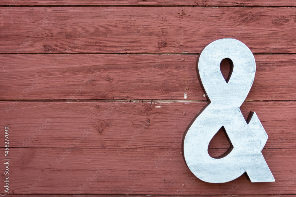 A Ampersand sign on a wall