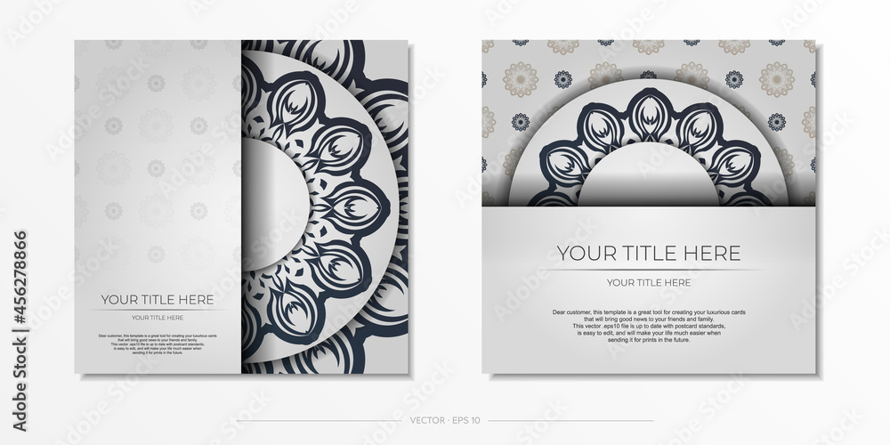 Stylish Postcard Design White with dark blue vintage patterns. Stylish invitation with Greek ornament.
