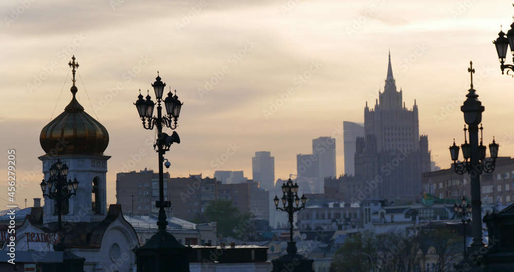 Moscow after sunset. View towards Cathedral of Christ the Savior and skyscrapers silhouette