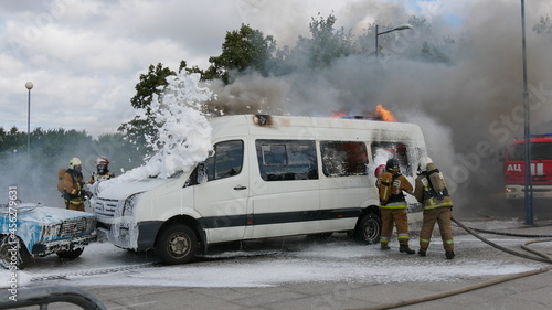 Firefighters extinguish the fire with foam