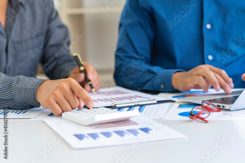Wallpaper Mural Business people discussing working and presenting the charts and graphs showing the results of their successful teamwork, the discussion aimed at reaching an agreement, Business concept. Torontodigital.ca