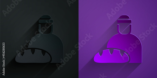 Paper cut Feeding the homeless icon isolated on black on purple background. Help and support. Giving food to the hungry concept. Paper art style. Vector