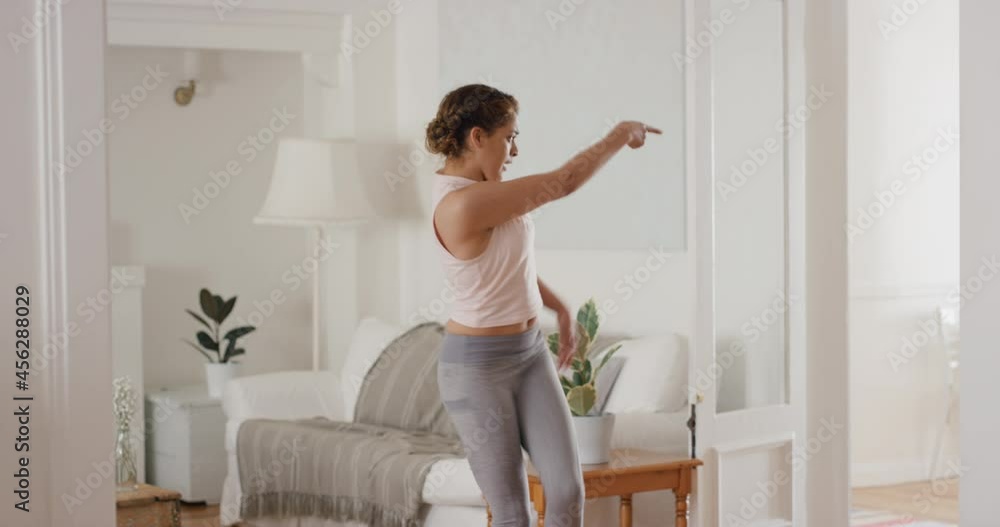 happy woman dancer having fun practicing hip hop dance moves at home celebrating enjoying dancing 4k happy woman dancer having fun practicing hip hop dance moves at home celebrating enjoying dancing 4k